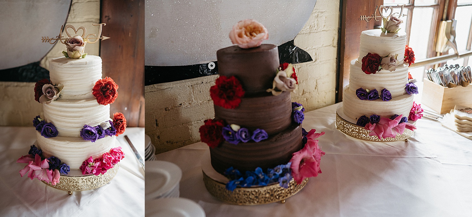 Three Tier wedding cake with floral details and heart wedding topper