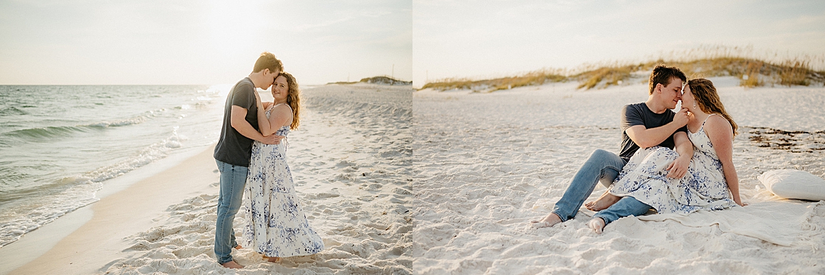 engaged couple sitting on the beach in dress and jeans by Emily burns photo