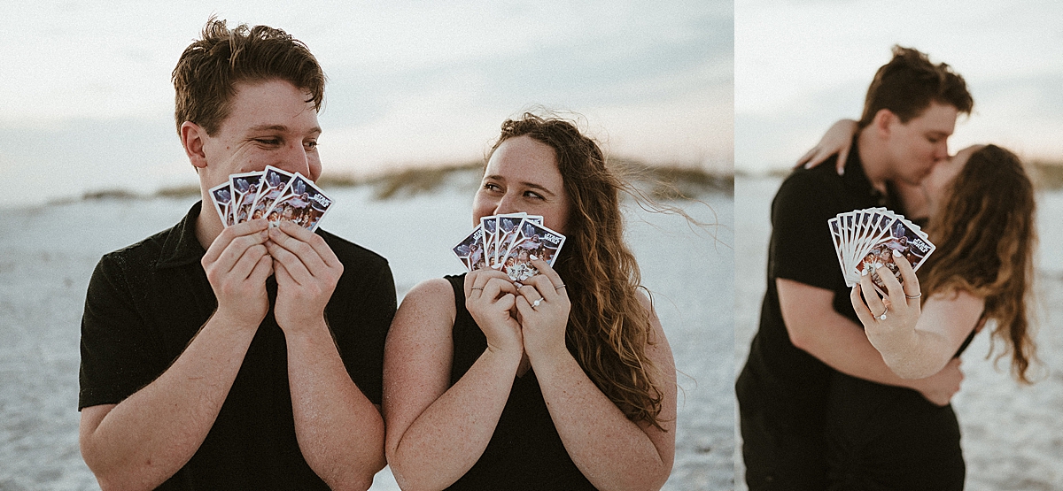 newly engaged couple showing off Star Wars playing cards by Destin engagement photographer 