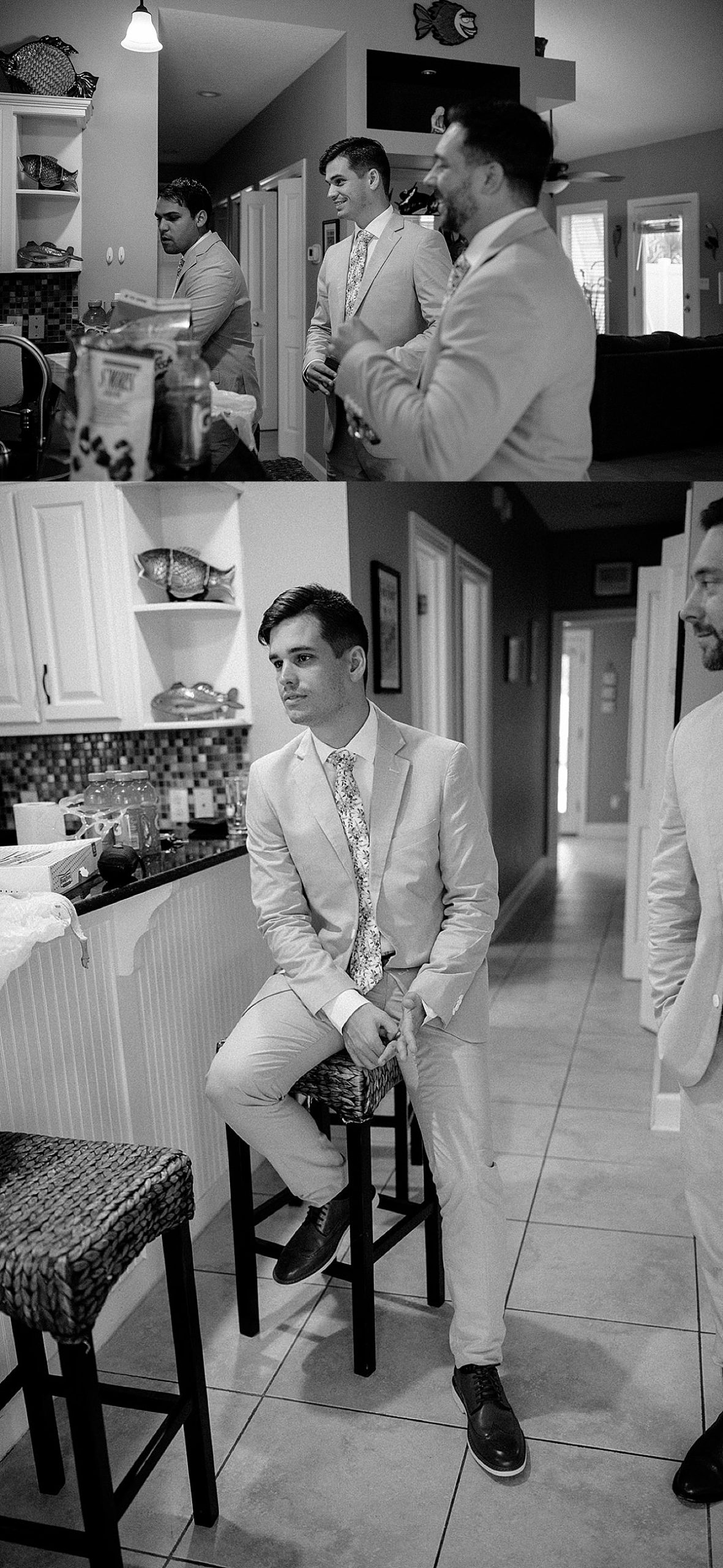 groom and groomsmen standing in kitchen of airbnb by florida wedding photographer 